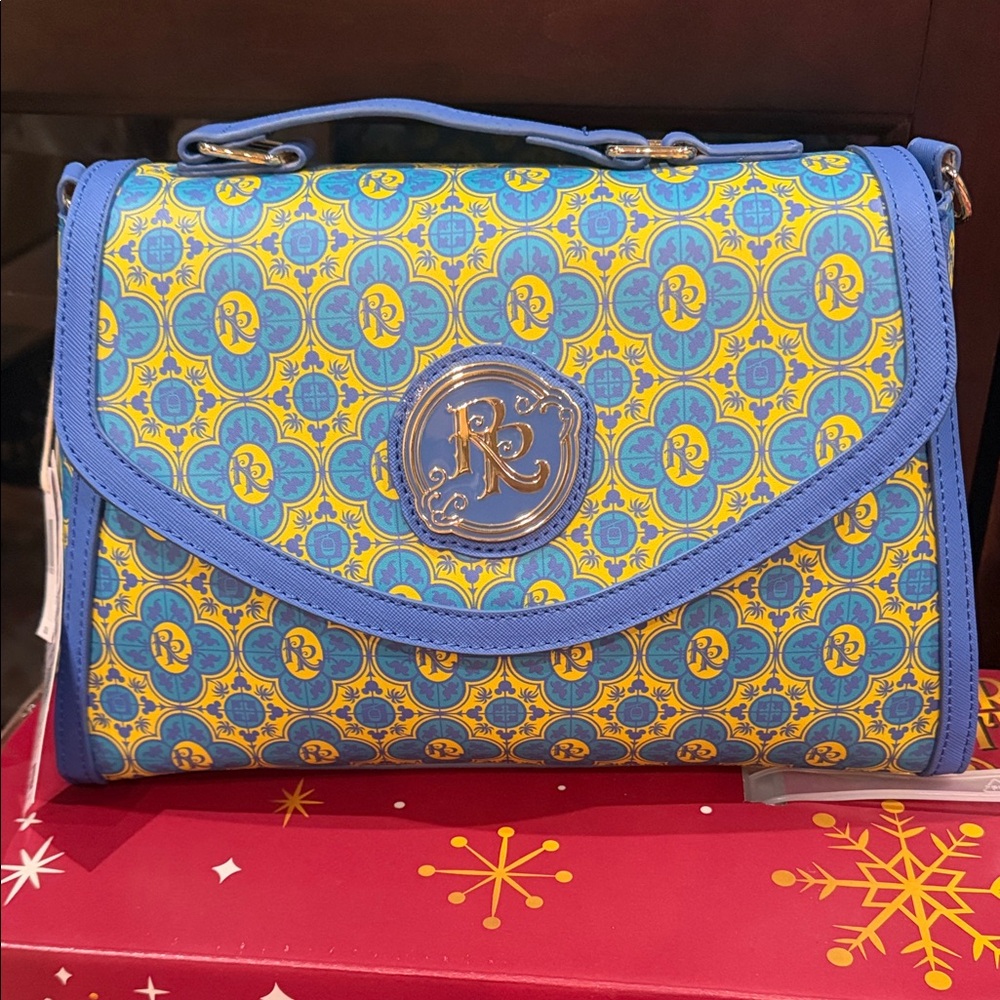 Disney parks loungfly Blue and Yellow